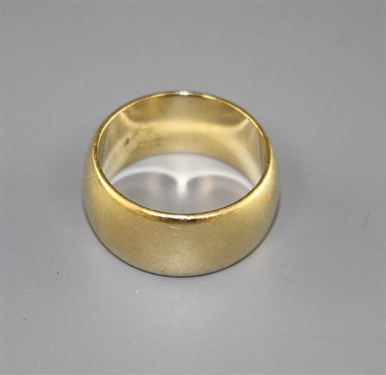 A 1970s 18ct gold wedding band, size M, 11.1 grams,